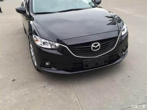 路上见过一个黑色两厢马自达.非常的吃惊,没看清是哪一款.