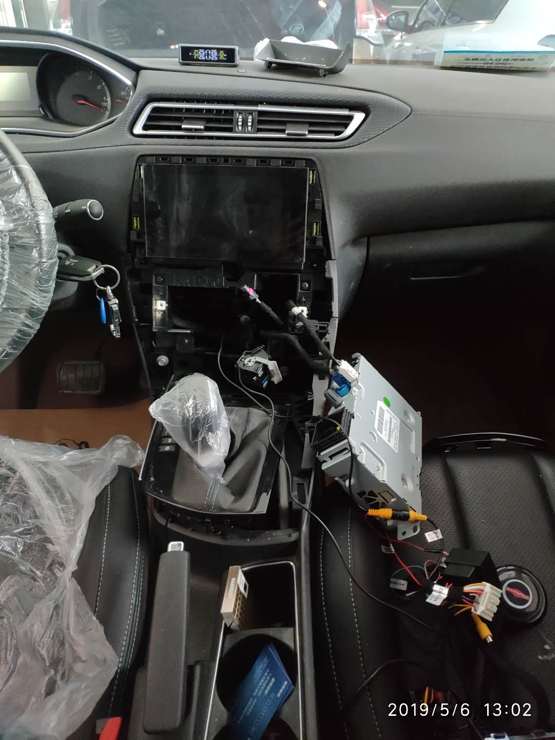 拆中控换导航模块了