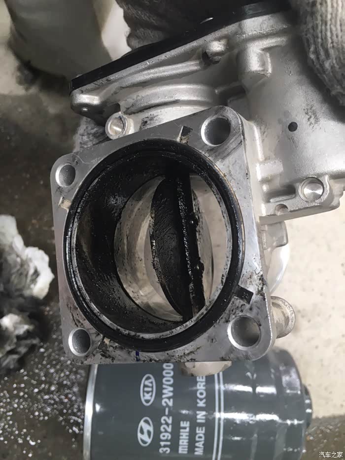 我一直用的原厂摩比斯,这是五万公里的积碳.