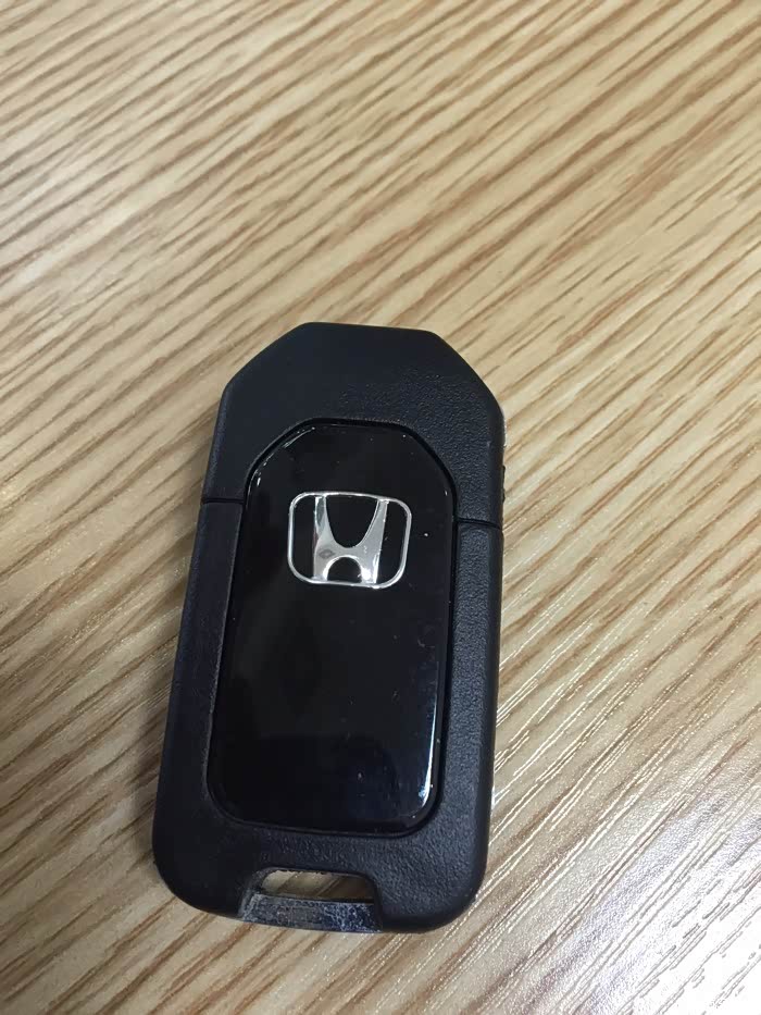 想换一把飞度车钥匙多少钱啊