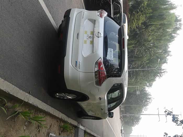 艰难的选车提车白色新奇骏20舒适版爱车作业