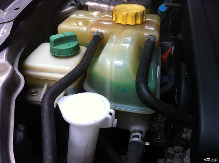 更换火花塞,防冻液是不是加多了.