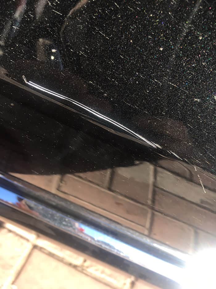 驾驶室车门被刮我该怎么处理