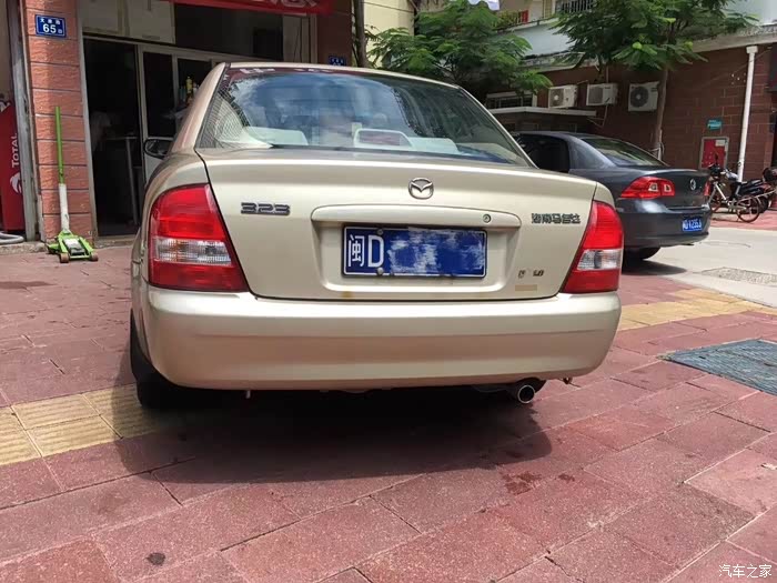 收了部02年第一批老马自达323玩老车也是为了信仰