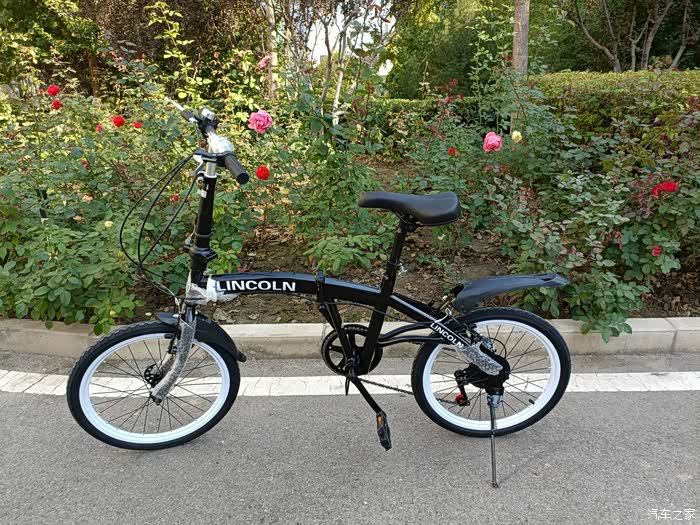 买林肯车送自行车