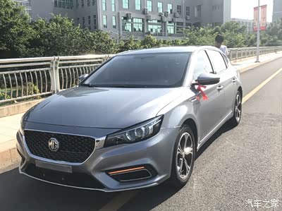 慕容云海开就mg车虽然当时还认识这个品牌但这个车标直记忆深刻那年