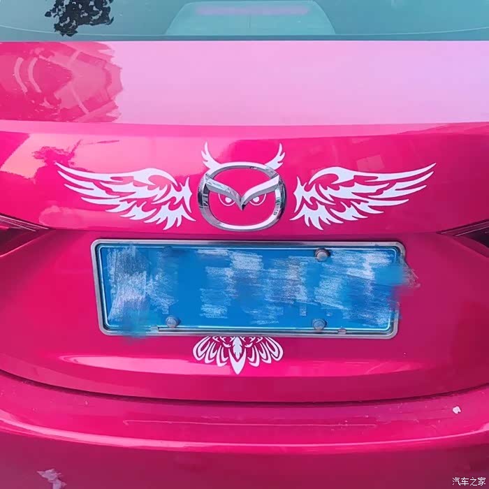 马自达车标贴猫头鹰交警会查吗如图