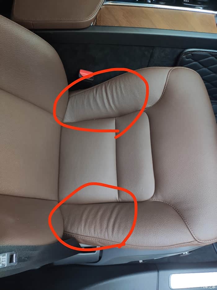 两个月的新车副驾驶座椅皮子起皱什么原因呢
