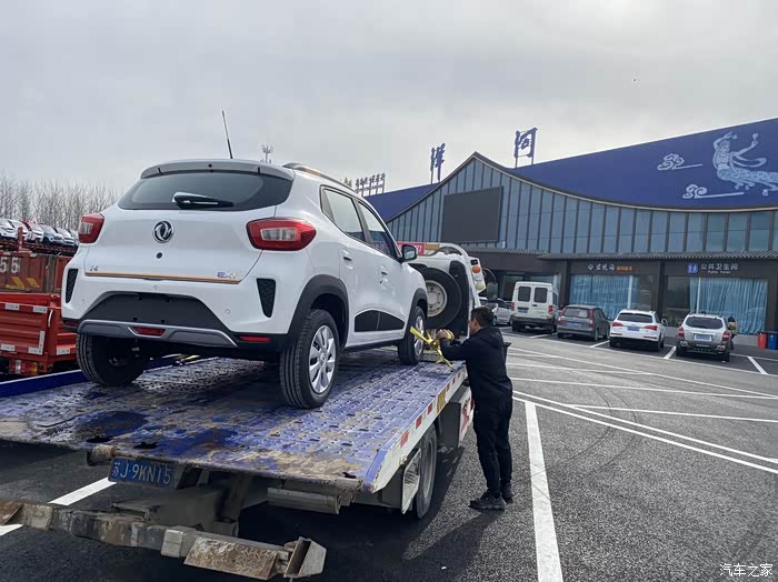 已购现车直接大板车拖回家