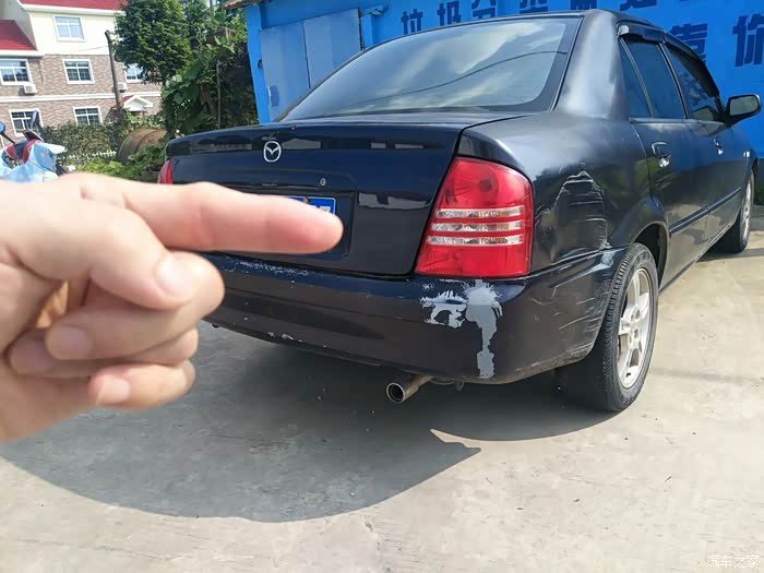 出一台05款马自达323