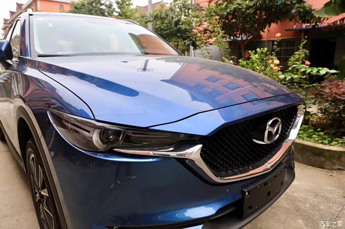 考虑很久了,还是选cx-5 智享2.0,喜欢蓝色的有照片吗?谢谢!