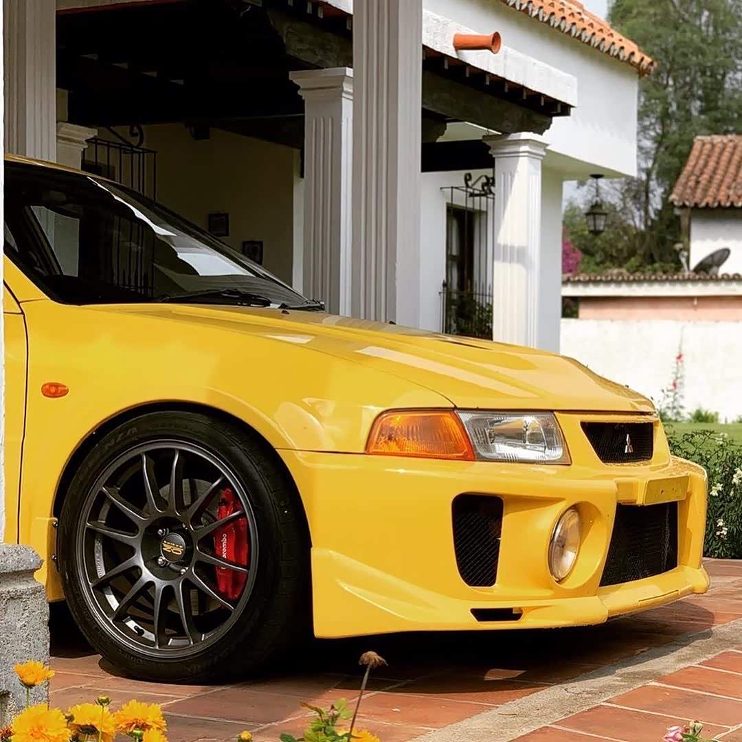 三菱evo 5 gsr黄色比较帅气.