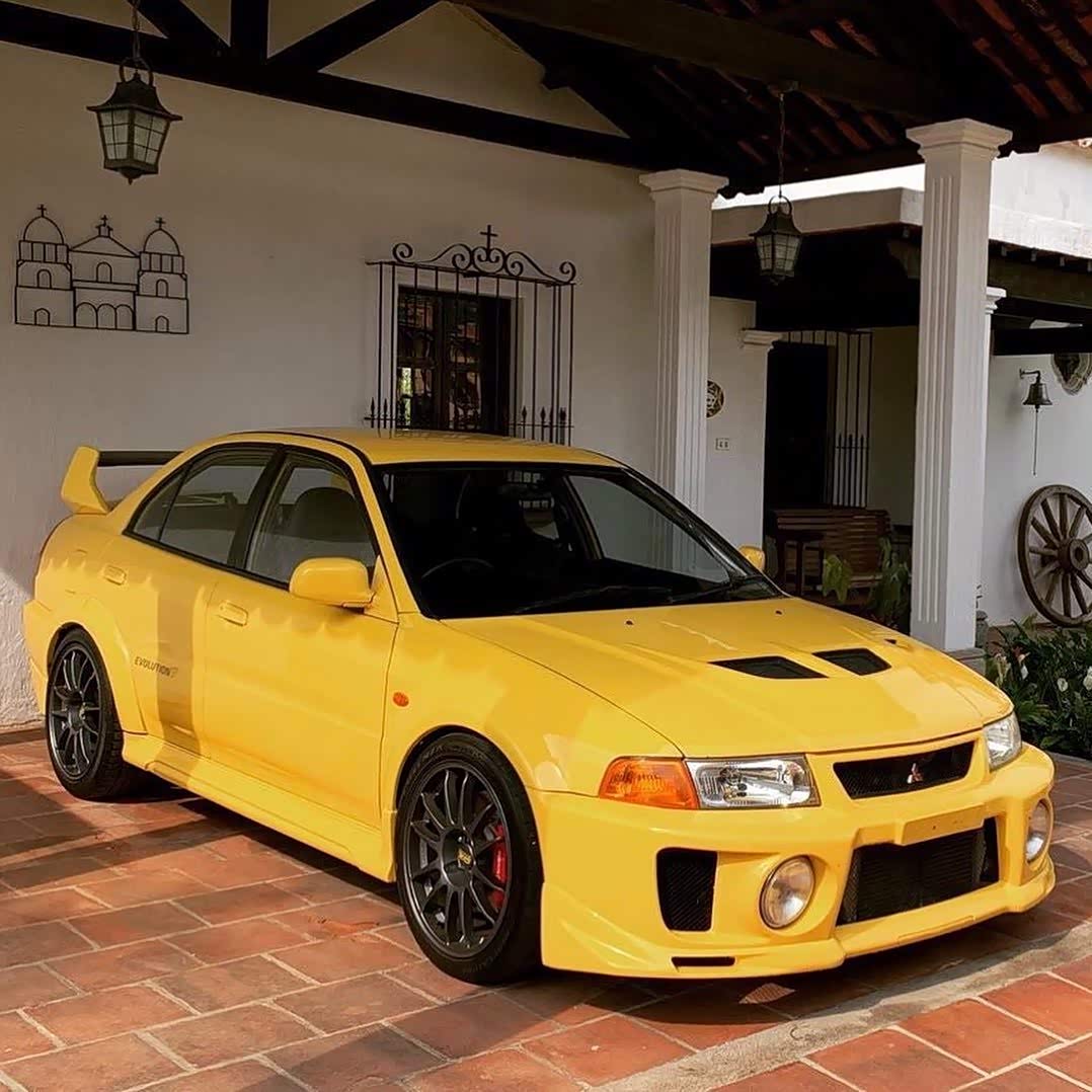 三菱evo 5 gsr黄色比较帅气.