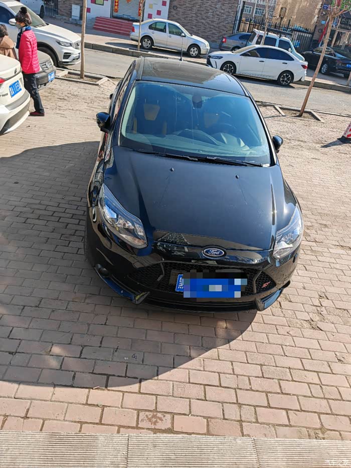 出14年五月福克斯st原车热血橙颜色黑色车衣车况原版原漆