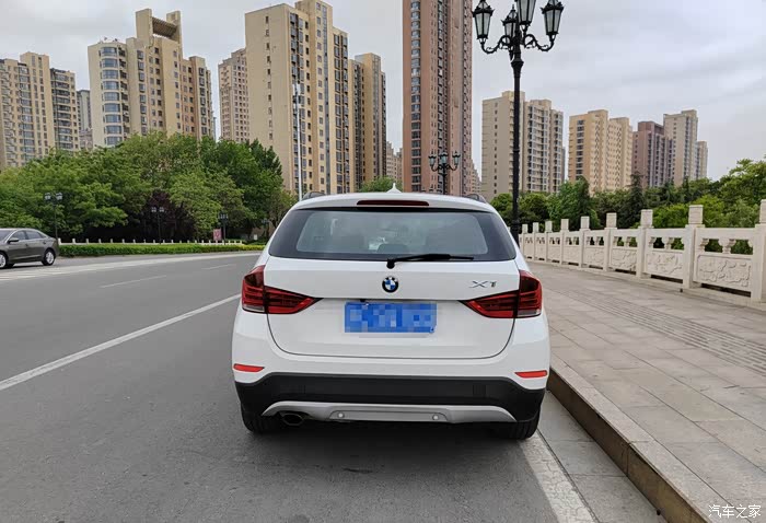 2012进口宝马x1雪山白,全车原版原漆,极品,明盘4.3万