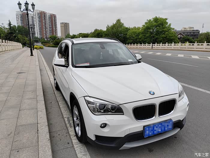 2012进口宝马x1雪山白,全车原版原漆,极品,明盘4.3万